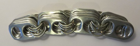 Adding more links to the bracelet.