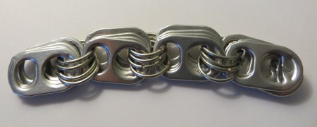 Adding more links to the bracelet.