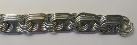 Adding more links to the bracelet.