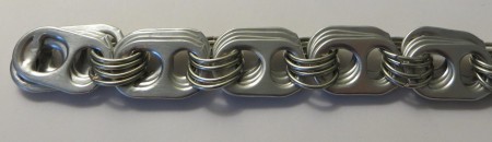 Adding more links to the bracelet.