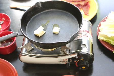 Melting butter in a pan.
