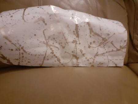 Wallpaper with a splatter gold design.