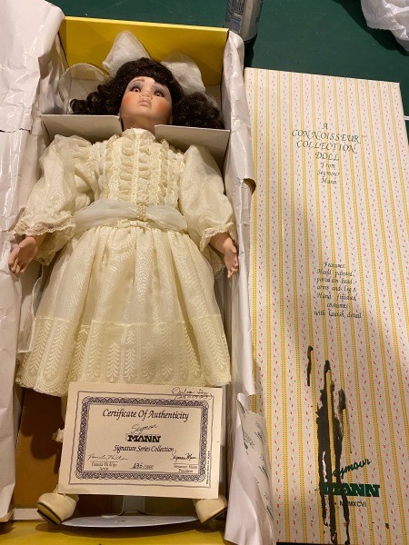 A doll in a box.
