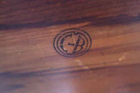 The Conant Ball marking on the underside of the bench.