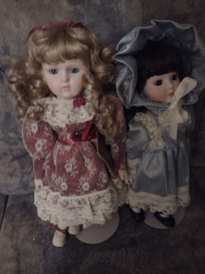 Two porcelain dolls.