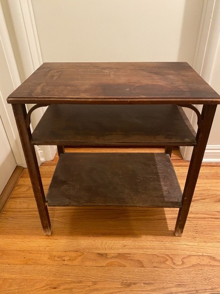 A small table with shelves.
