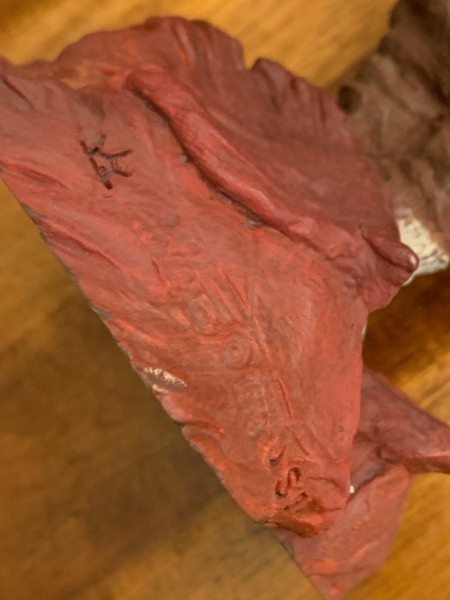 A marking on the bottom of a gnome.