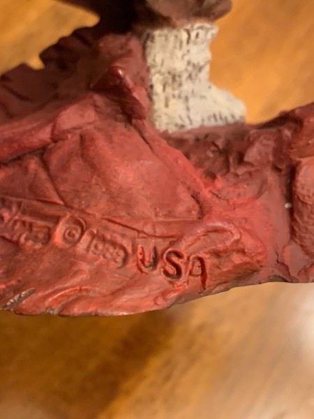 A marking on the bottom of a gnome.