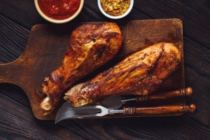 Two roasted turkey drumsticks.