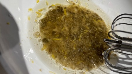 Whisking the mixture together.