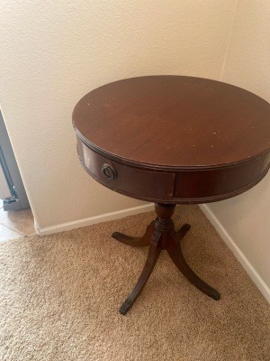 A small round pedestal table.