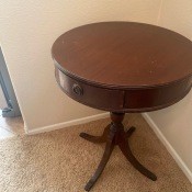 A small round pedestal table.