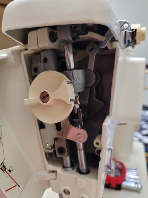 The inside of a sewing machine.