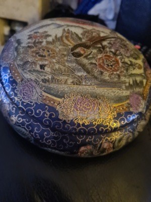 An old decorative ceramic pot.