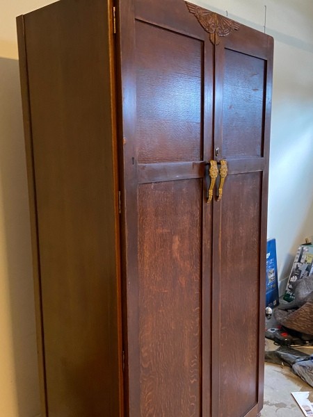 A tall wooden wardrobe.