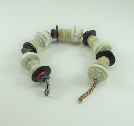 Making the snowmen into a bracelet.