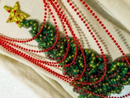 Adding beads to the sweater