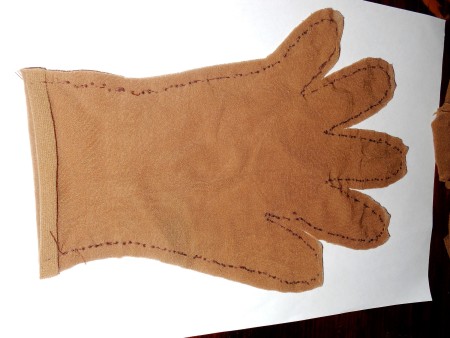 The cut out glove fabric.