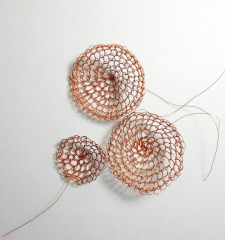 Attaching the crocheted pieces.