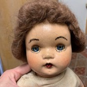 The face of an old doll.