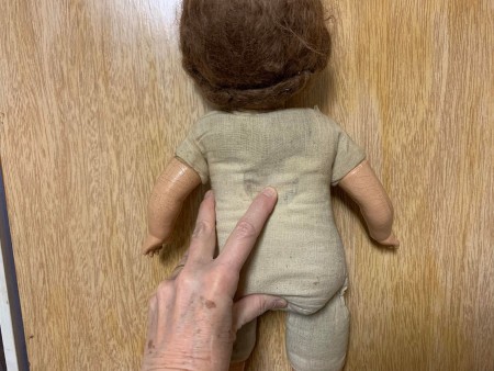 The back of an old doll.