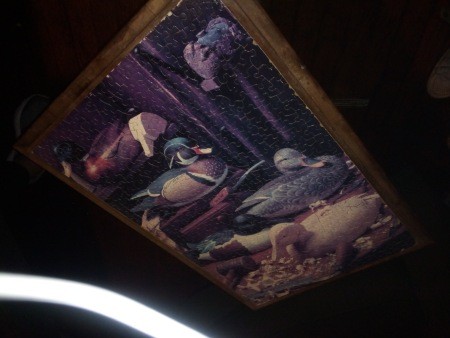 The table with a puzzle on the top.