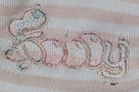 The stitching on the toy.