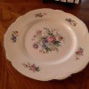 A china plate with a floral pattern.