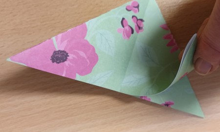 Folding the wings of the butterfly.