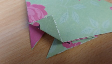 Adding small folds to the paper.
