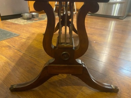 The lyre legs of a coffee table.