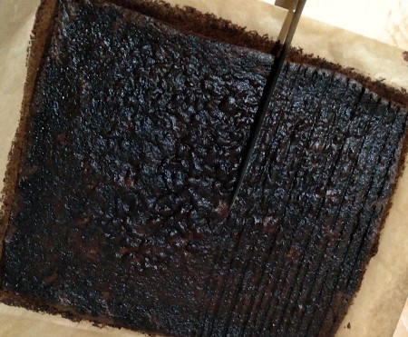 Cutting slices in the cake.