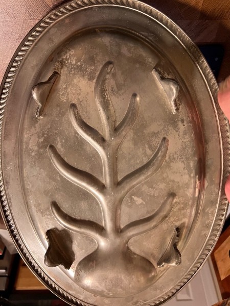 The tarnished silver tray.