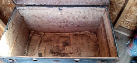 The inside of an old chest.
