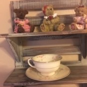 Teddy bears on a shelf.