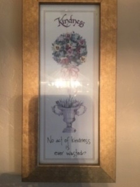 A picture with a decorative vase.