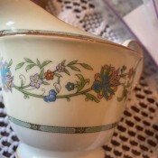 A floral pattern on a china creamer.