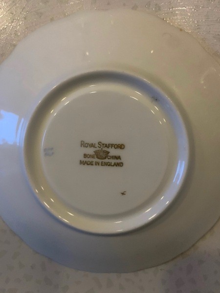 The marking on the bottom of the tea cup.