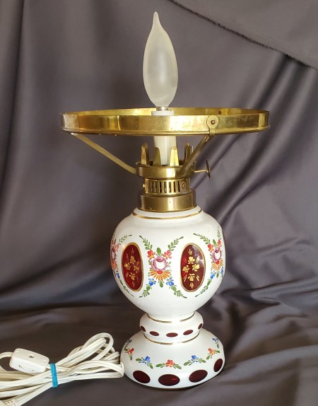 A vintage painted table lamp.