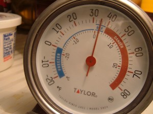 A thermometer inside a refrigerator.