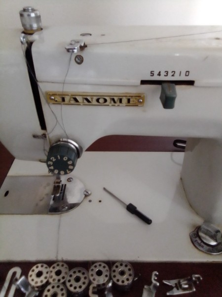 A close up of a sewing machine.