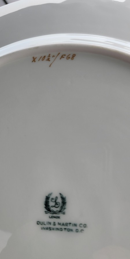 The manufacturer's marking on the back of a china plate.