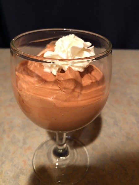 A dish of chocolate mousse.