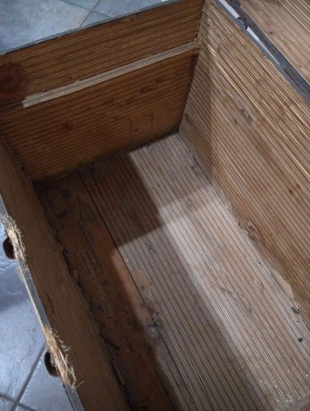 Inside an old trunk.