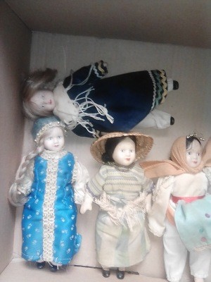 A collection of old porcelain dolls.