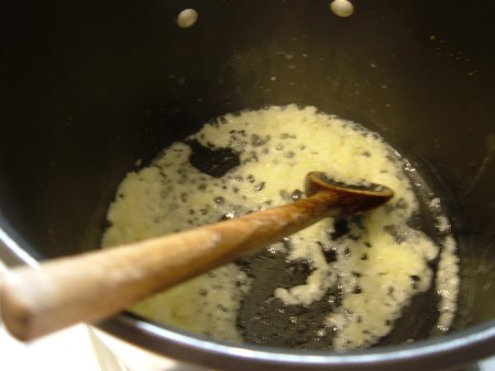 Melting butter in a pan.