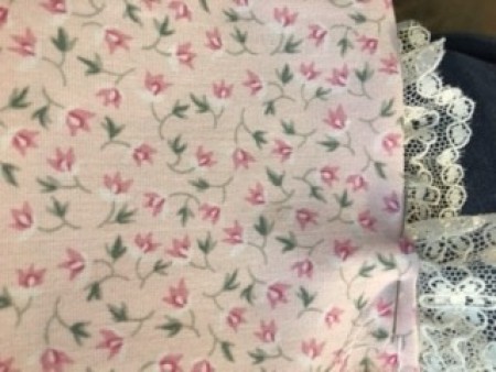 Adding lace to the edges.