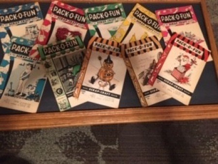 Organizing magazine covers in a frame.