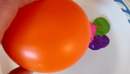 A blown up latex balloon.