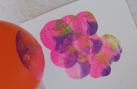 Several dots on the white paper.